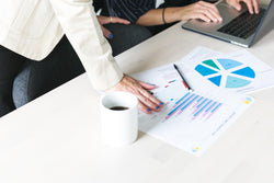 Office woman hands on report